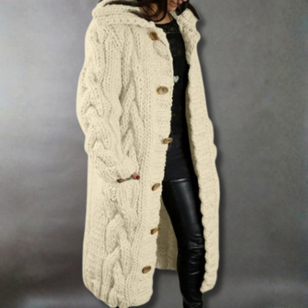Women's blue oversized cable knit longline coat with a chunky texture