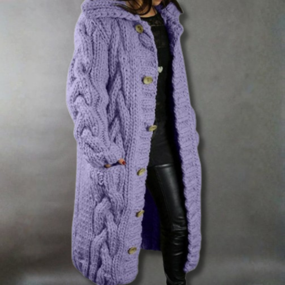 Women's blue oversized cable knit longline coat with a chunky texture