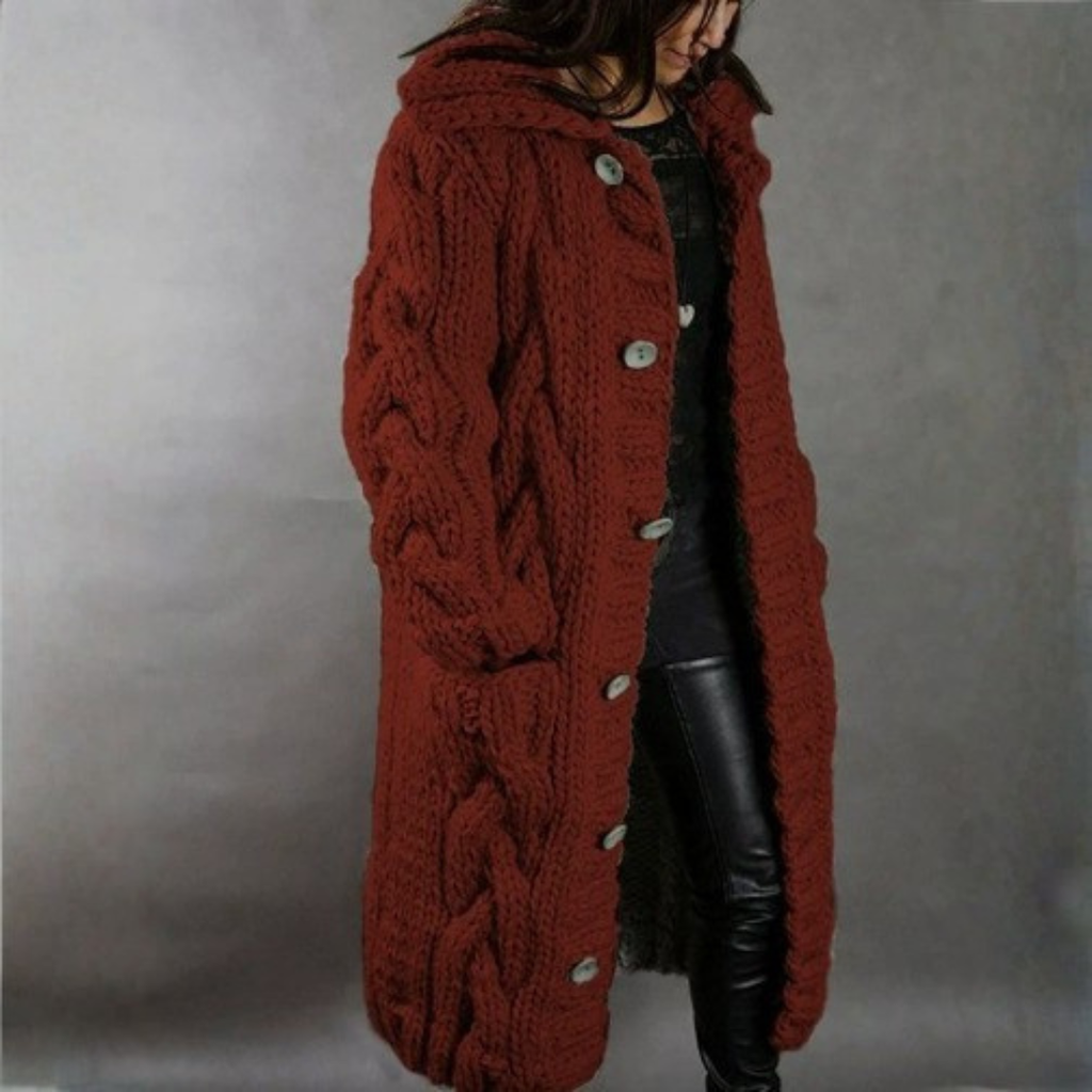 Women's blue oversized cable knit longline coat with a chunky texture
