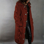 Women's blue oversized cable knit longline coat with a chunky texture