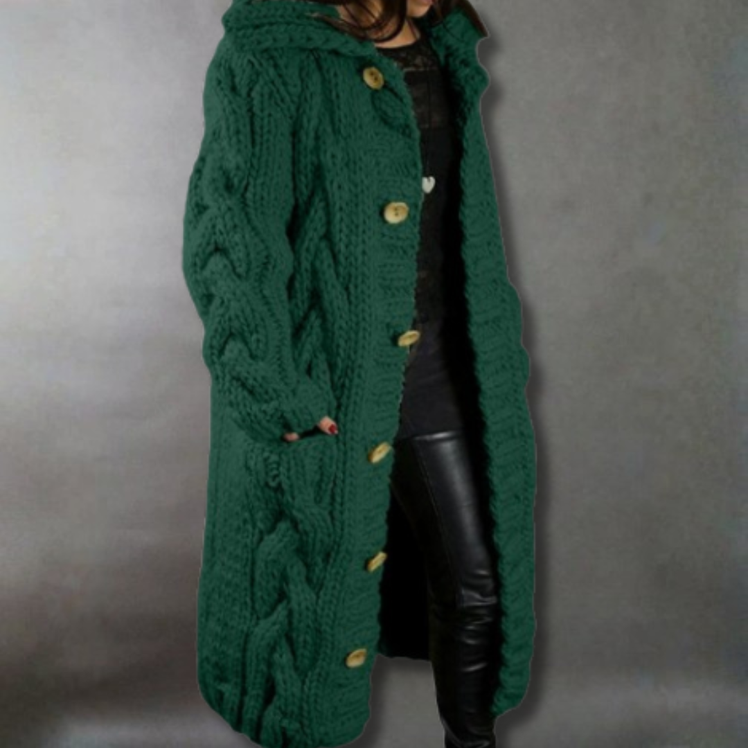Women's pink oversized cable knit longline coat with a chunky texture