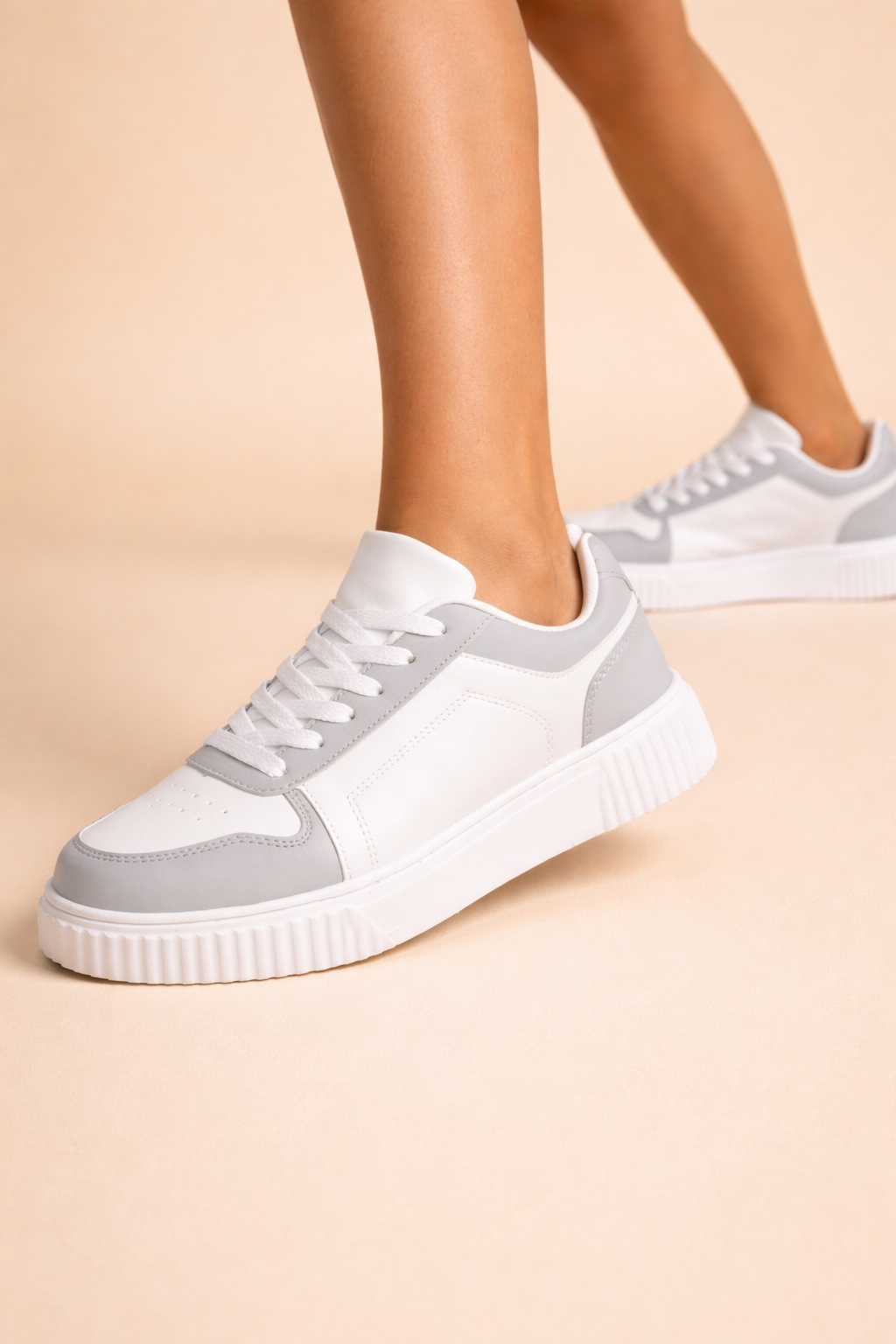 Women's beige non-slip chunky trainers with a cushioned interior