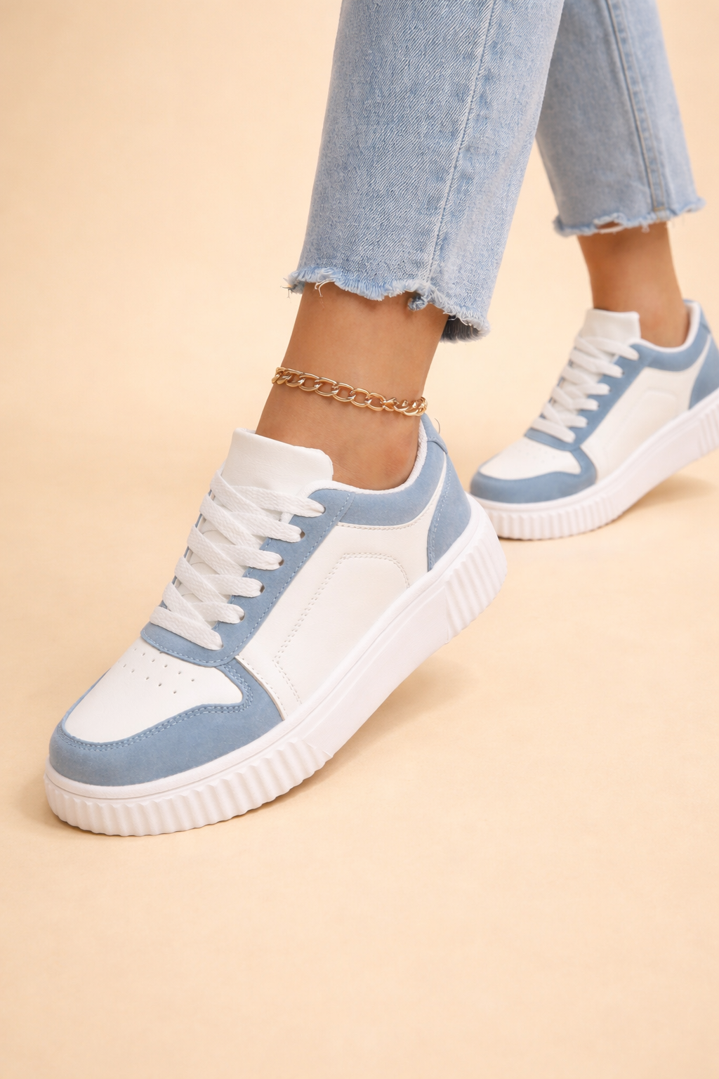 Women's beige non-slip chunky trainers with a cushioned interior