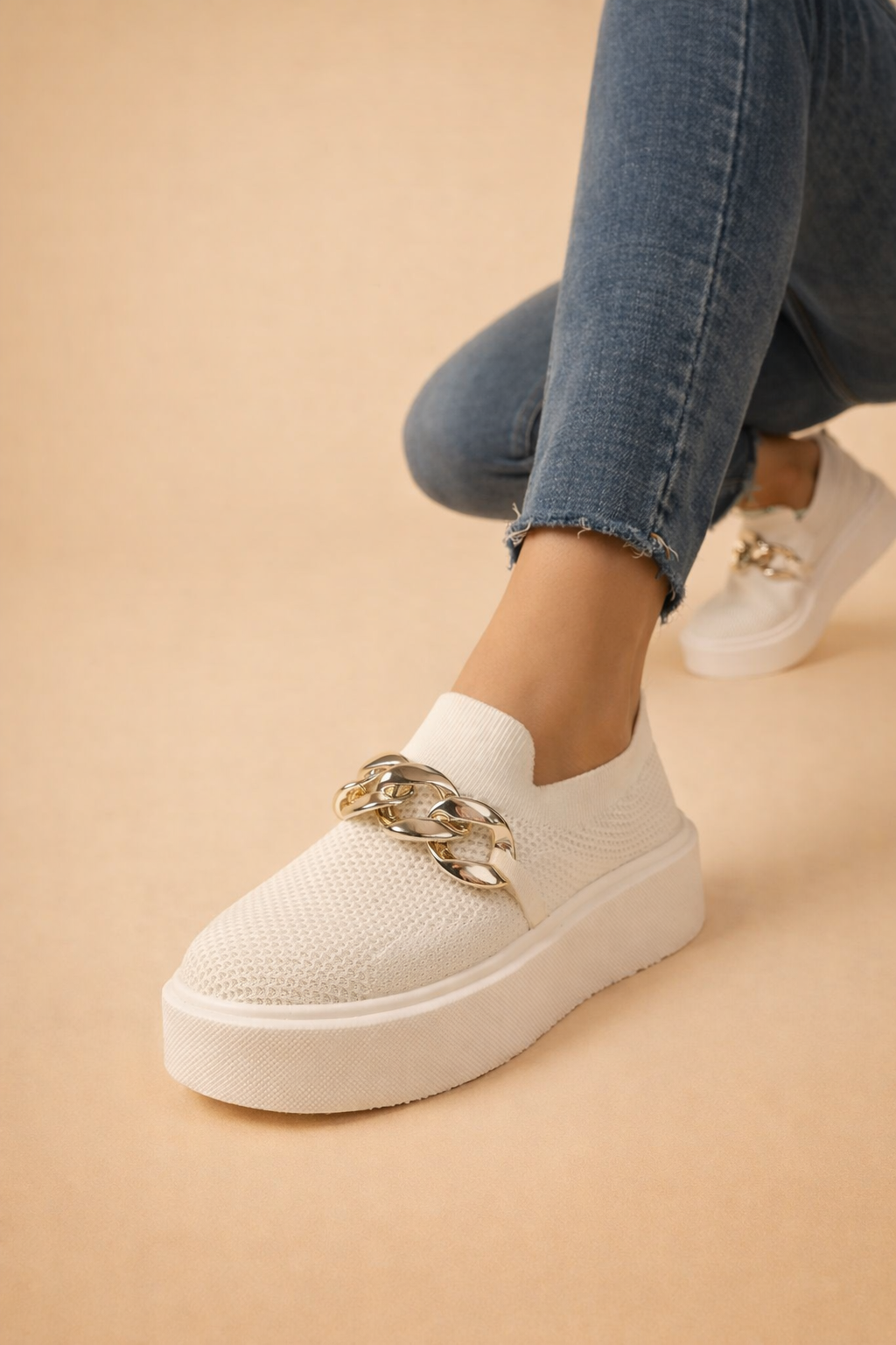 Women's brown platform slip-on trainers with a knit upper