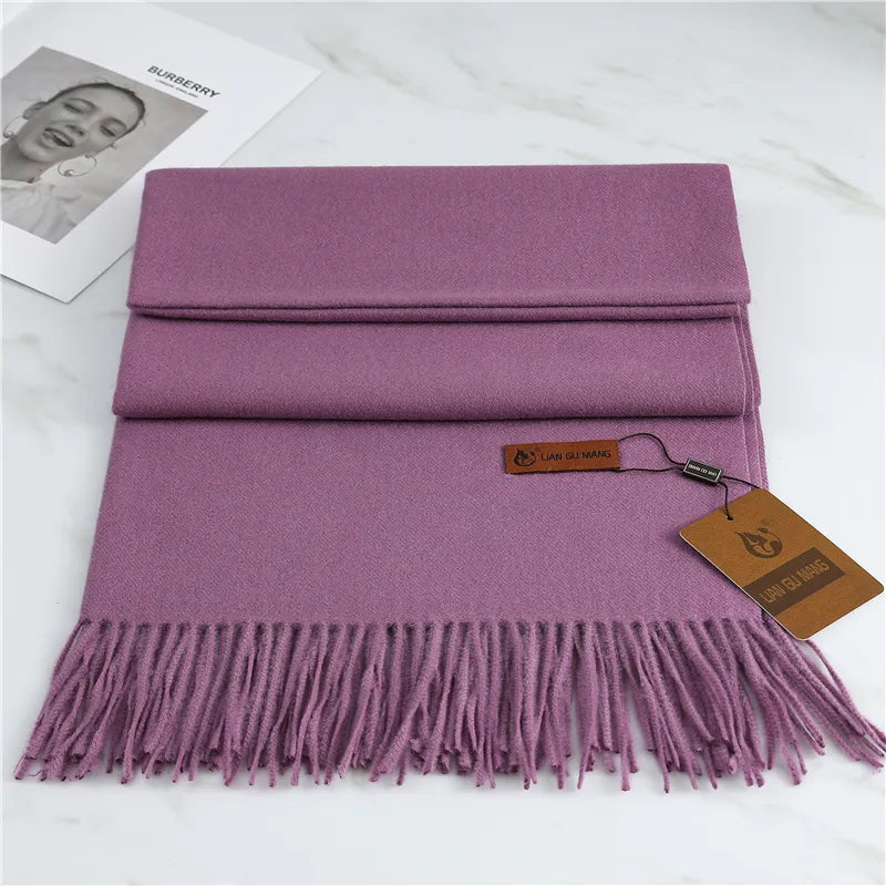 Women's purple cashmere scarf with soft tassel trim for autumn styling