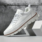 Leather trainers with supportive sole, product still life