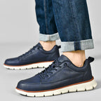 Leather trainers with supportive sole, product still life