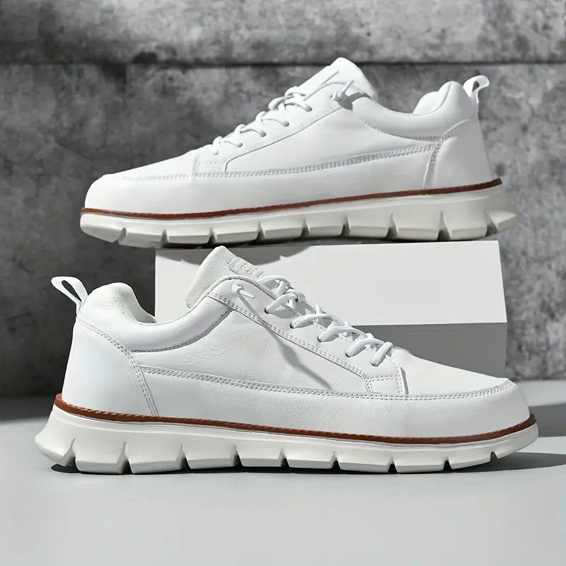 Leather trainers with supportive sole, product still life