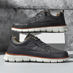 Leather trainers with supportive sole, product still life