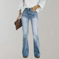 Women's blue high waisted flared jeans in a light wash with a frayed hem