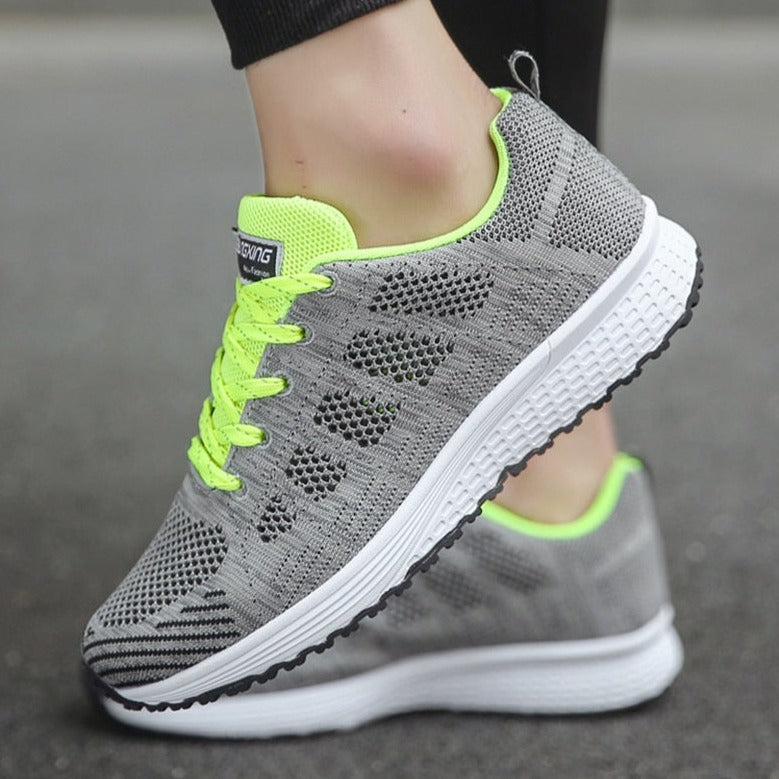 Women's grey and lime lightweight mesh walking trainers with a lace up closure