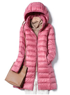 Women's blue lightweight quilted puffer jacket with an insulated fill
