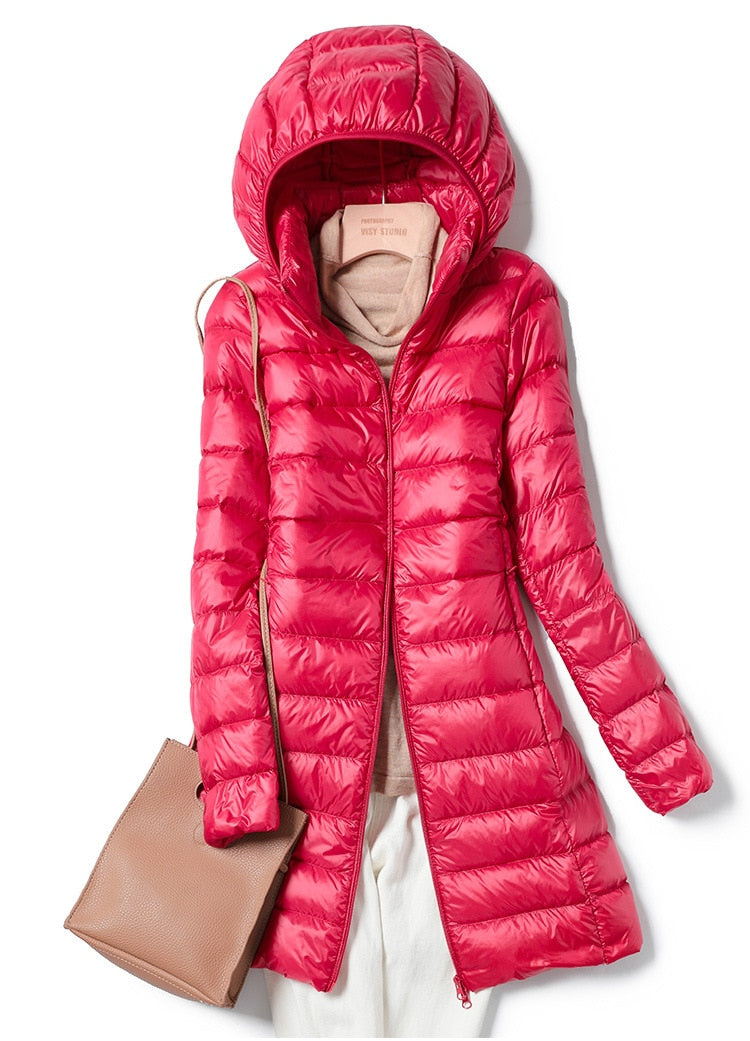 Women's blue lightweight quilted puffer jacket with an insulated fill