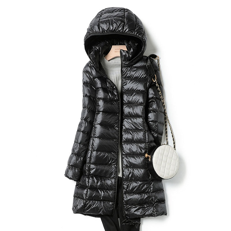 Women's blue lightweight quilted puffer jacket with an insulated fill
