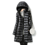 Women's blue lightweight quilted puffer jacket with an insulated fill