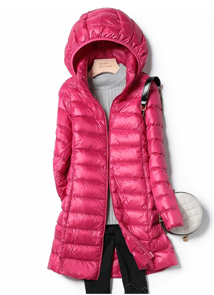 Women's blue lightweight quilted puffer jacket with an insulated fill