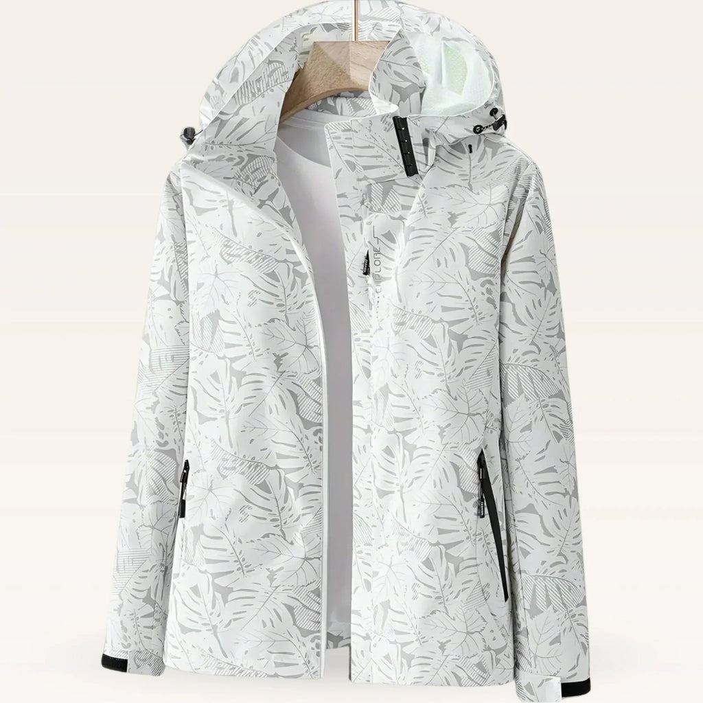 White lightweight hooded windbreaker jacket with tropical leaf print