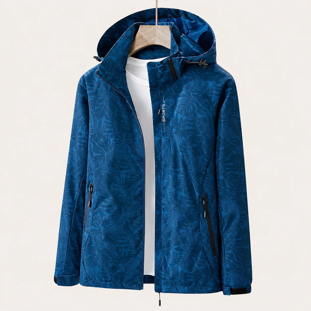 blue lightweight hooded windbreaker jacket with tropical leaf print
