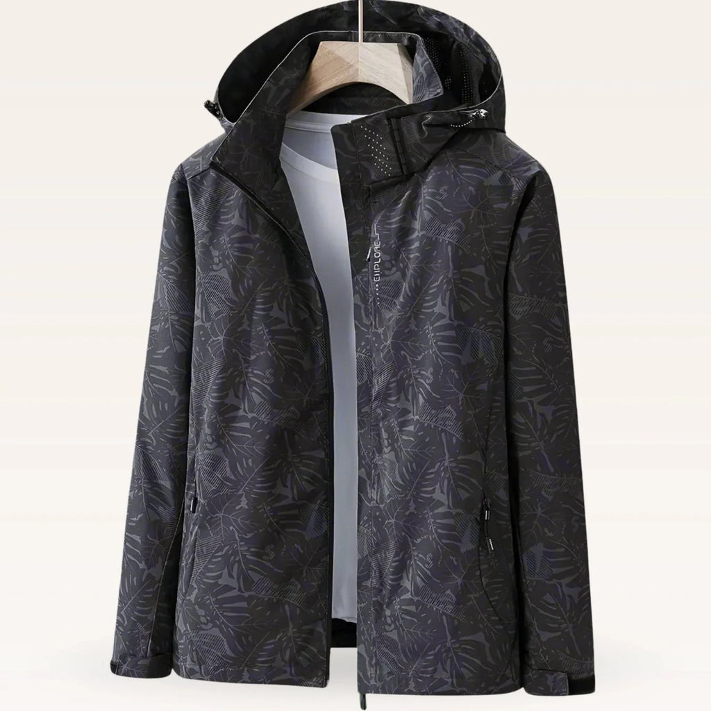 Black lightweight hooded windbreaker jacket with tropical leaf print