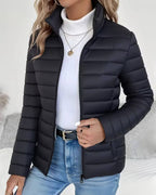 Women's black lightweight puffer jacket with stand collar