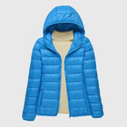 Women's turquoise quilted hooded puffer jacket with a water-resistant finish