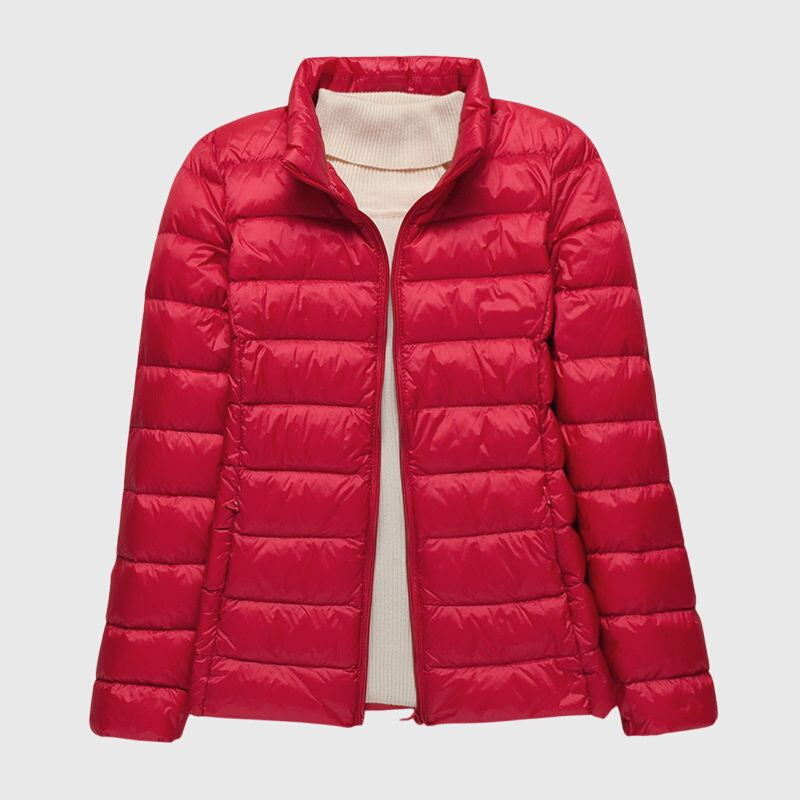 Women's black quilted hooded puffer jacket with a water-resistant finish