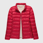 Women's black quilted hooded puffer jacket with a water-resistant finish