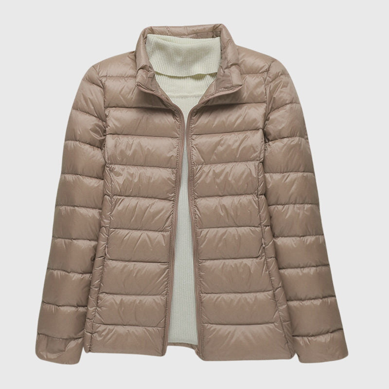 Women's black quilted hooded puffer jacket with a water-resistant finish