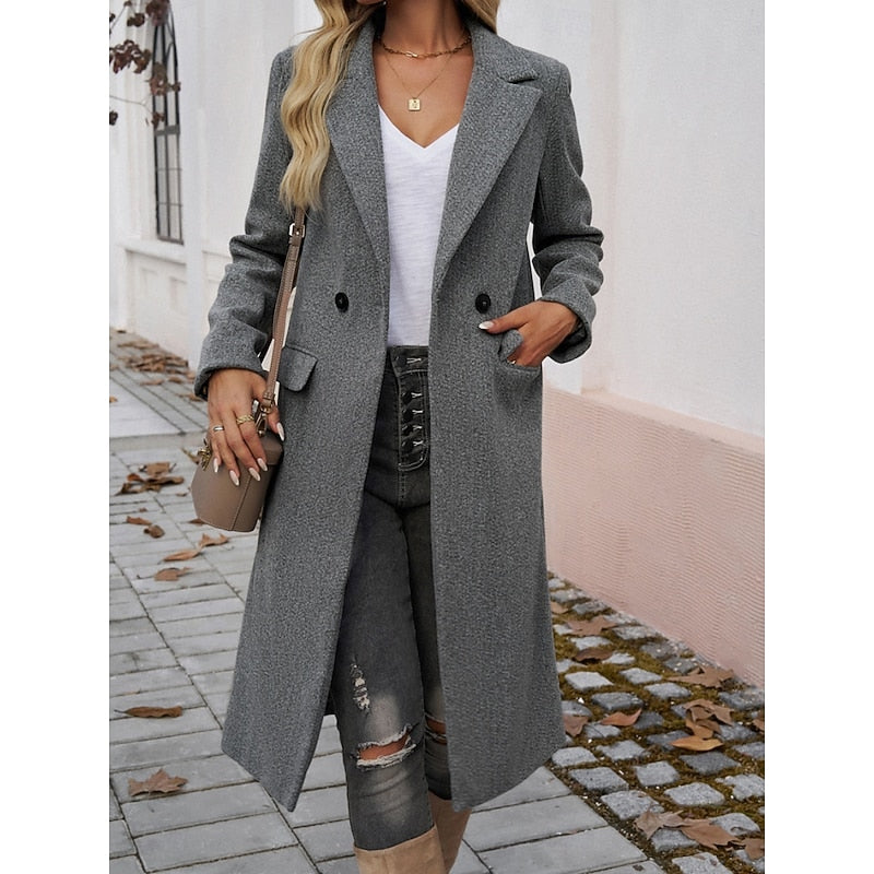 Tailored long coat with a notch lapel and front button fastening, product still life