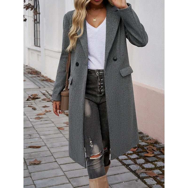 Tailored long coat with a notch lapel and front button fastening, product still life
