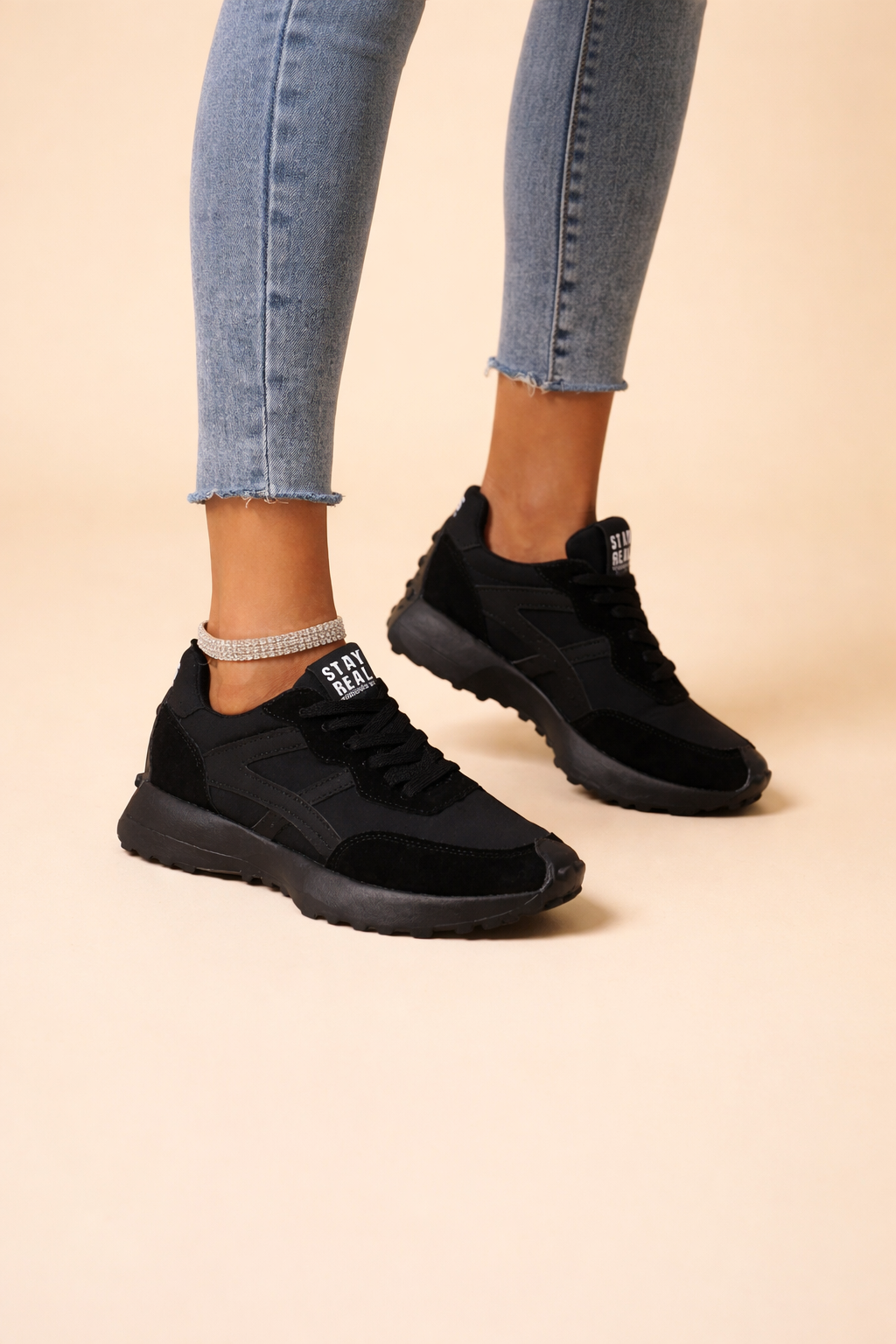 Women's black lightweight running trainers with a breathable mesh upper