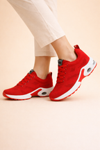 Women's black lightweight sports trainers with a breathable knit upper