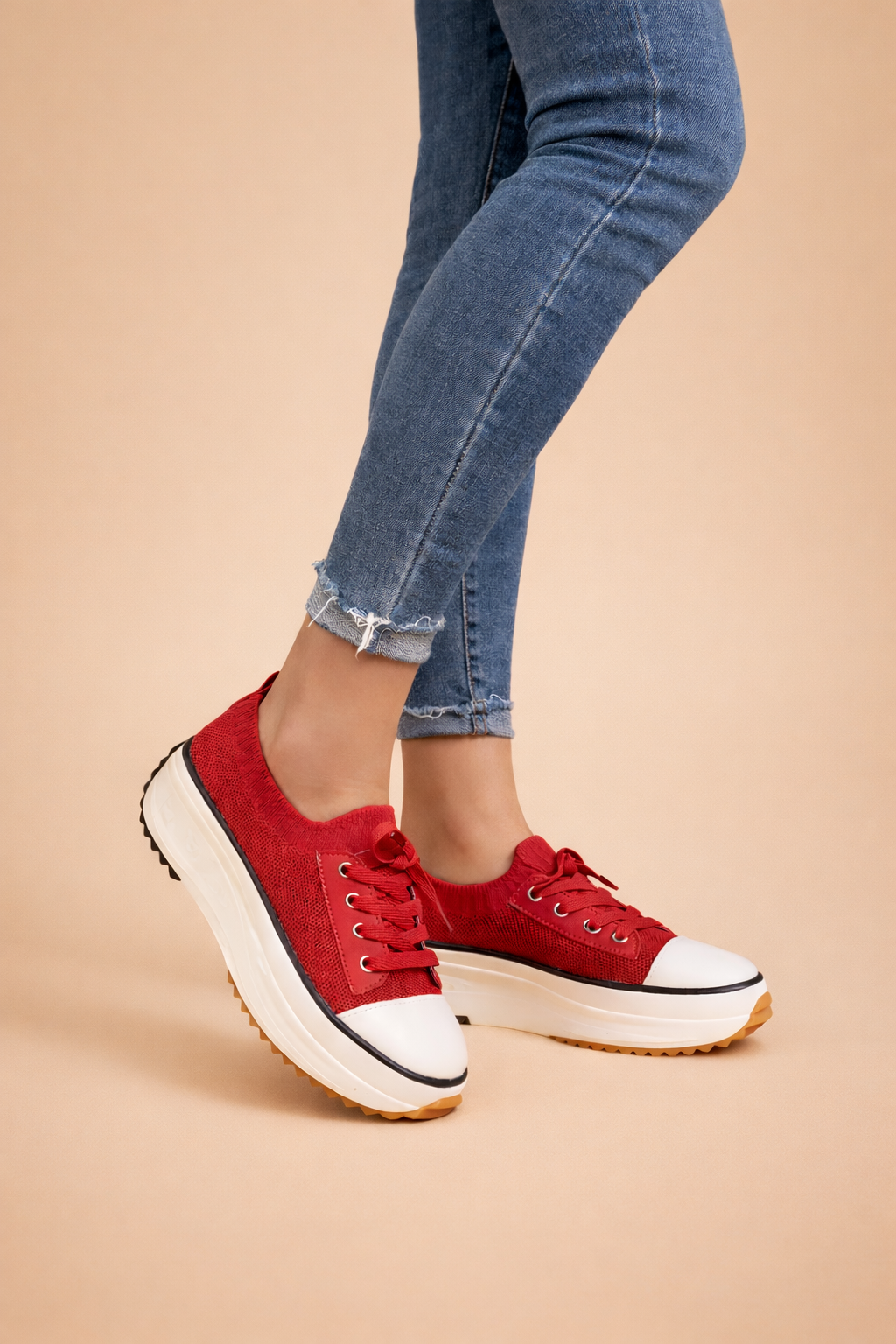 Women's white platform knit trainers with a lace-up front