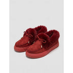 Fur-lined moccasin slippers, side view