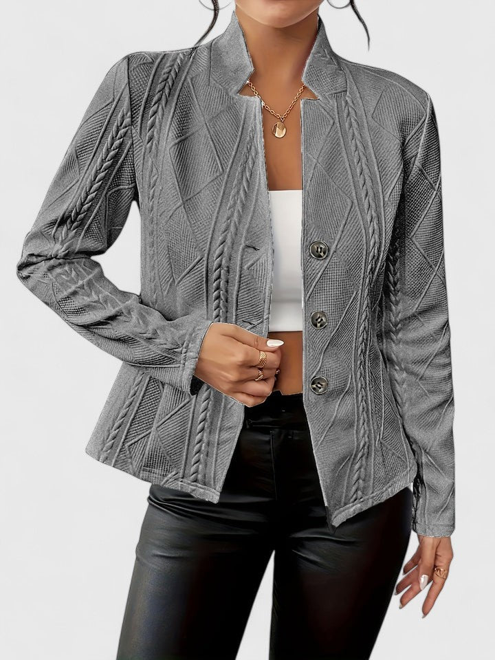 Women's white cropped tailored jacket with a textured finish