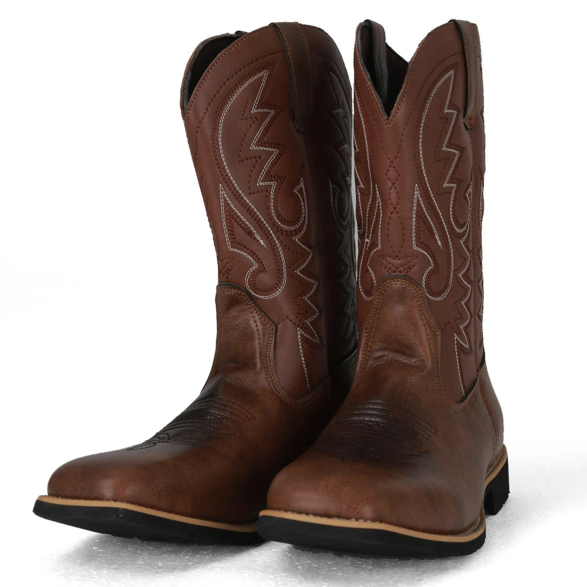 Brown men's Western cowboy boots with a stitched shaft and pointed toe