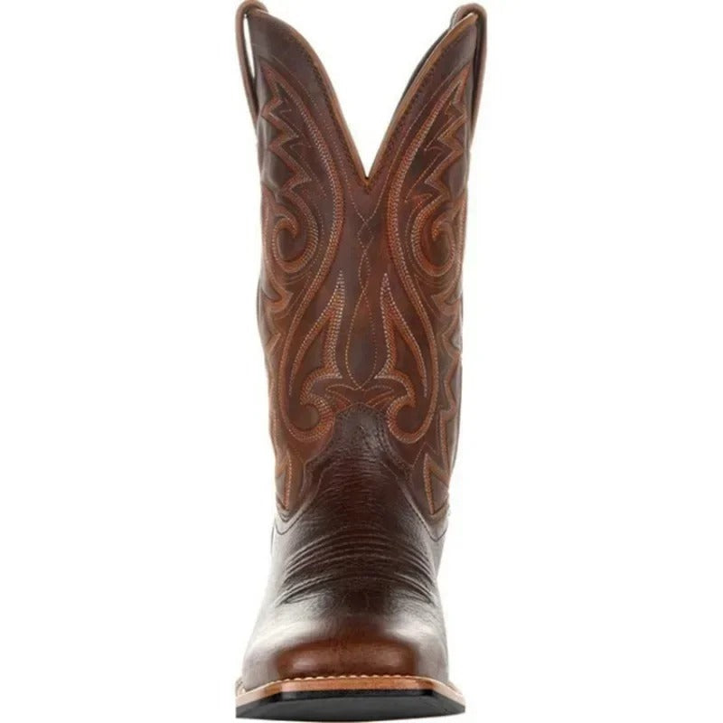 Brown men's Western cowboy boots with a stitched shaft and pointed toe