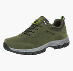 Grey men's waterproof hiking shoes with a grip outsole for autumn trails