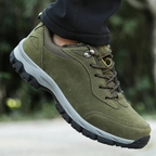 Grey men's waterproof hiking shoes with a grip outsole for autumn trails