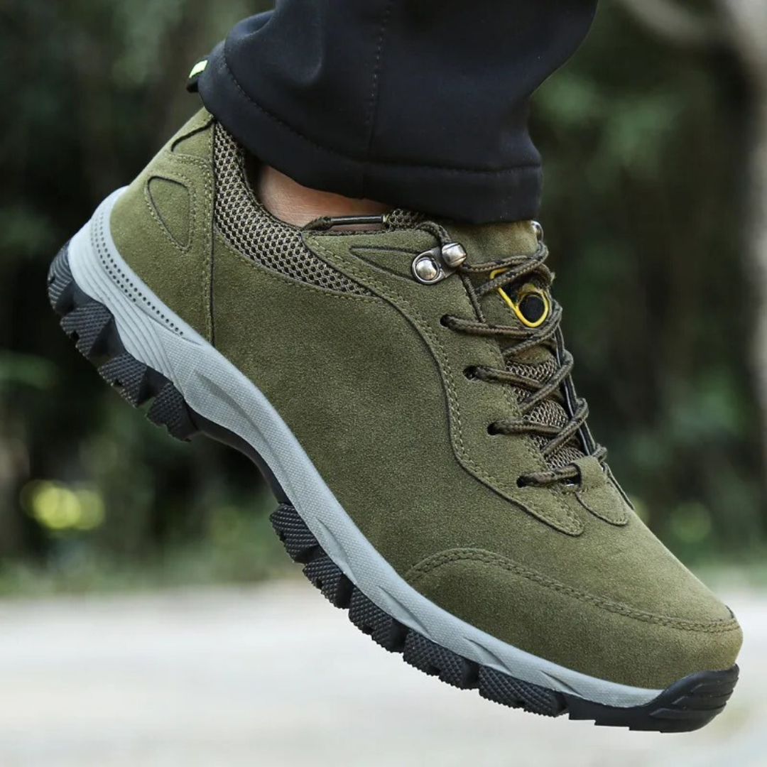 Grey men's waterproof hiking shoes with a grip outsole for autumn trails