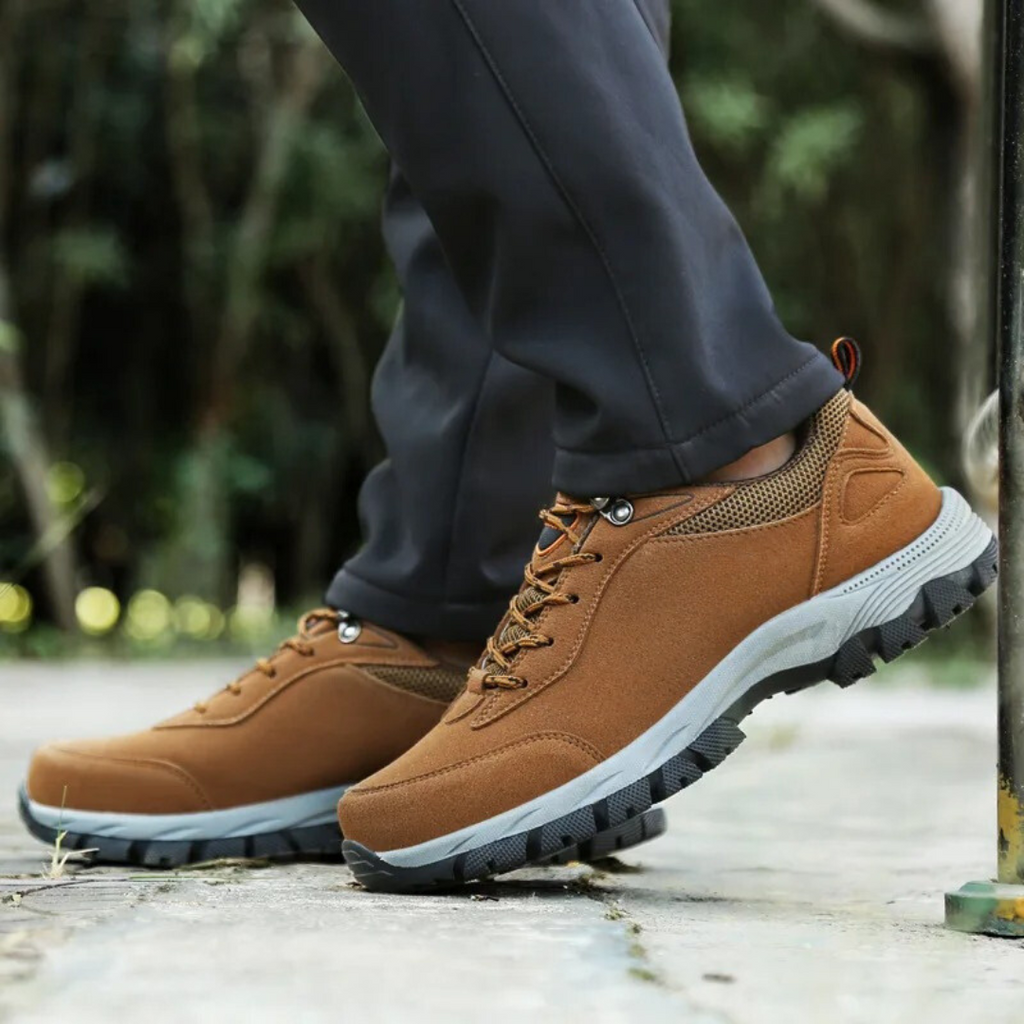 Grey men's waterproof hiking shoes with a grip outsole for autumn trails