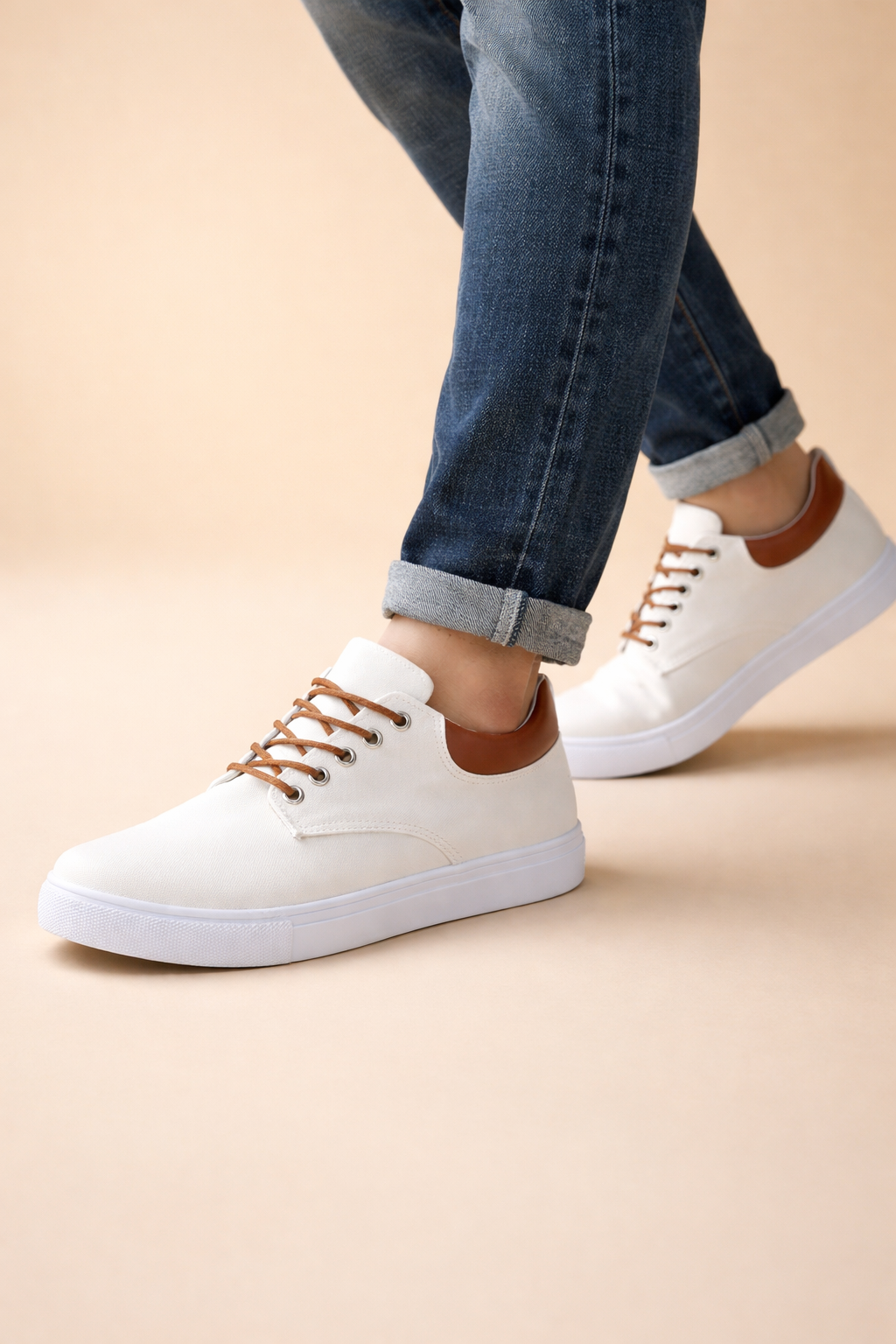 Brown men's canvas trainers with a breathable lace-up design