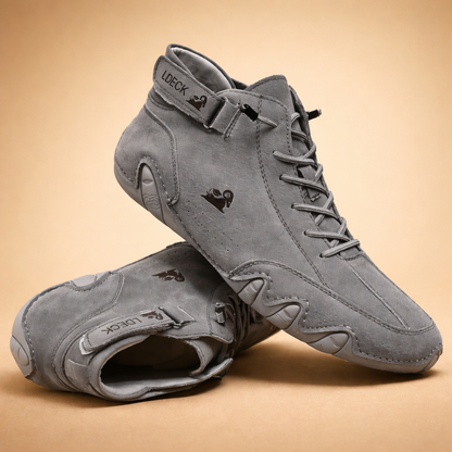 Brown fleece-lined high-top trainers with a non-slip sole