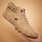 Brown fleece-lined high-top trainers with a non-slip sole