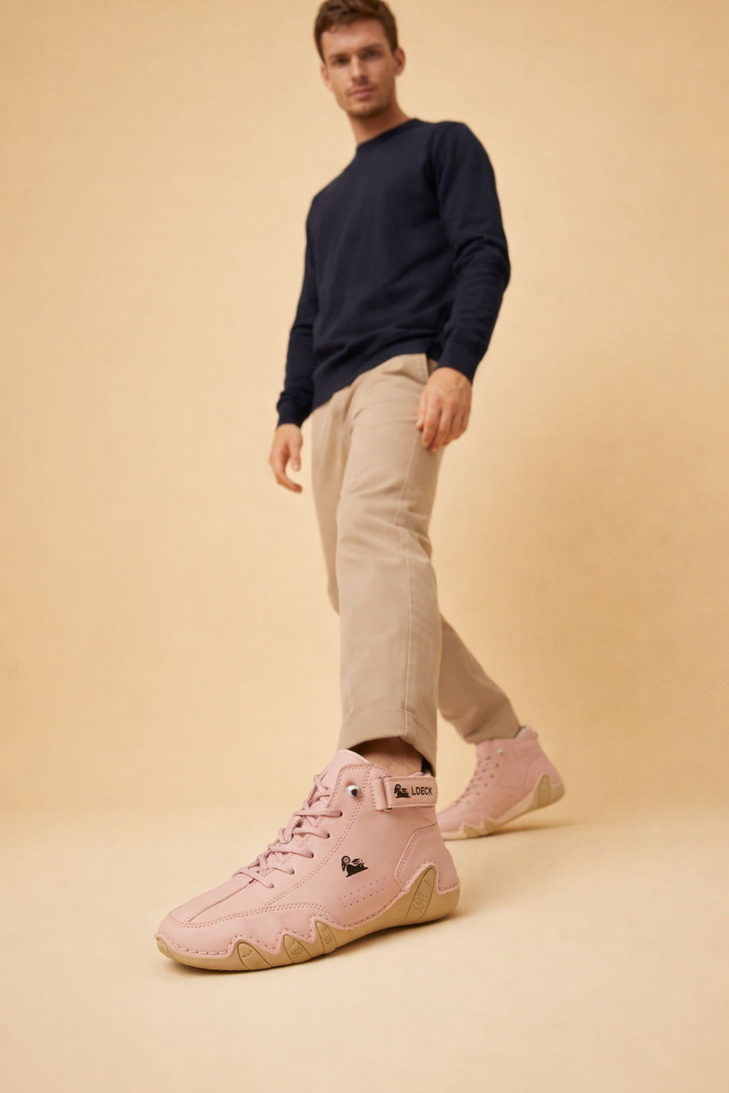 Brown fleece-lined high-top trainers with a non-slip sole