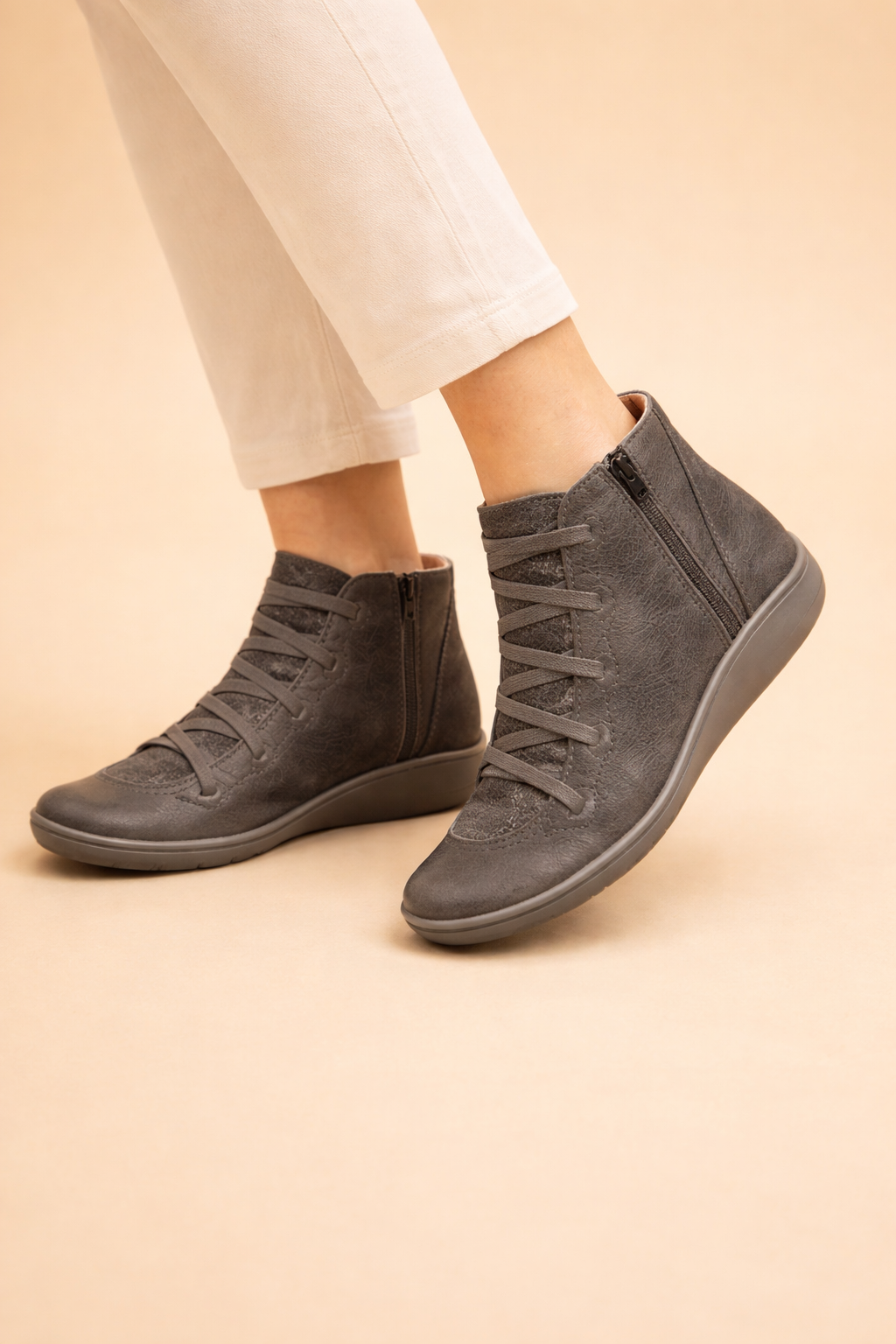 Women's brown low block heel ankle boots with a cushioned interior