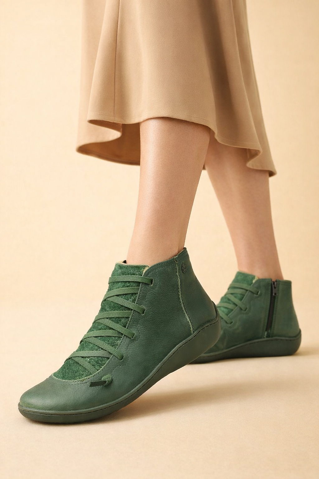 Women's brown low block heel ankle boots with a cushioned interior