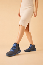 Women's brown low block heel ankle boots with a cushioned interior