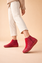 Women's brown low block heel ankle boots with a cushioned interior
