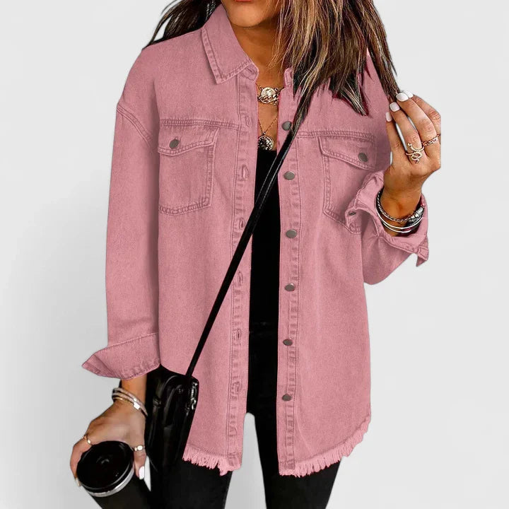 Women's black oversized denim jacket with classic front pockets detail